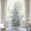 9' King Noble Flock Artificial Christmas Tree with 700 Warm White LED Lights